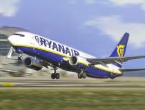 Ryanair reduce numărul...
