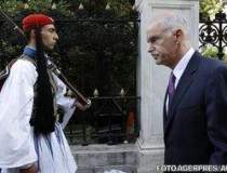 Premierul grec si-a remaniat...
