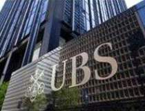 Sute de bancheri UBS ar putea...