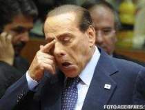Berlusconi nu renunta la...