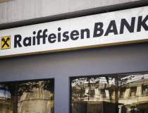 Profitul Raiffeisen Bank bate...