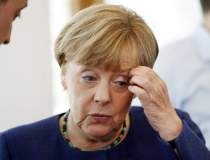 Merkel, intre ciocan si...