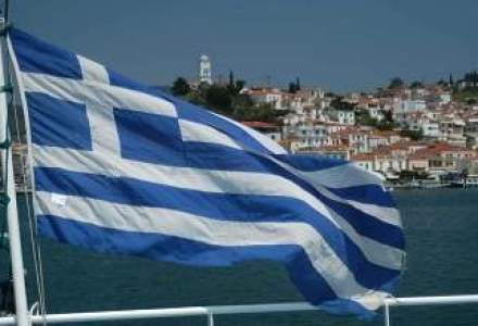 Contributia FMI la al doilea pachet pentru Grecia scade la jumatate