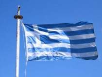 Premierul Greciei cere...