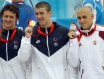 Americanul Michael Phelps a...