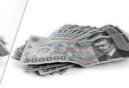 Moneda nationala s-a depreciat usor fata de euro