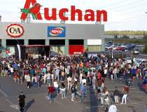 Reactia retailerului Auchan...