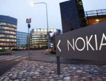 Nokia raporteaza pierderi de...