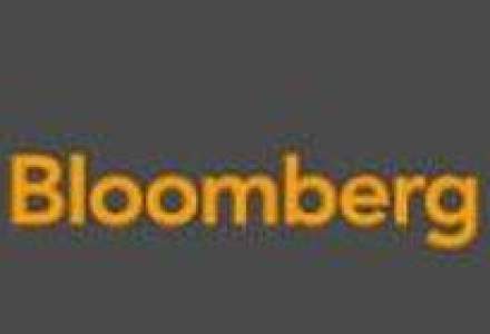 Merrill Lynch vrea sa-si vanda participatia in cadrul agentiei Bloomberg