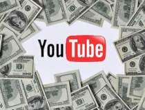 YouTube va introduce taxa pe...