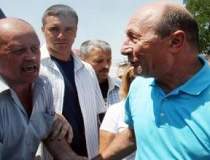 Traian Basescu participa la...