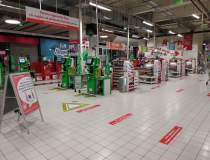 Magazinele Auchan își...