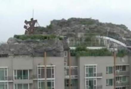 Un chinez si-a construit vila pe acoperisul unui bloc de 26 de etaje