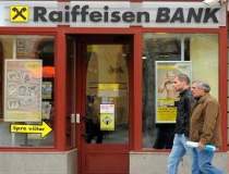 Profitul Raiffeisen Bank a...