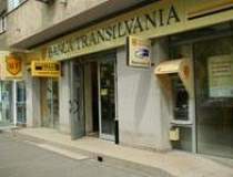 Banca Transilvania isi...