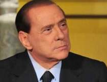 A primit Berlusconi pasaport...