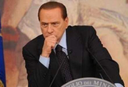 Silvio Berlusconi, huiduit de zeci de manifestanti la intrevederea cu liderul PD