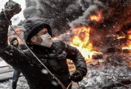 Violentele de la Kiev ii pun pe fuga pe investitori: Banii din Rusia nu sunt o solutie