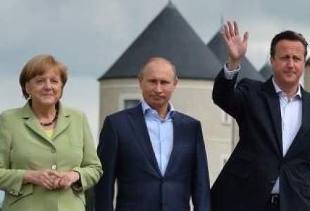 Vladimir Putin, intalnire pe plajele Normandiei cu Angela Merkel si David Cameron