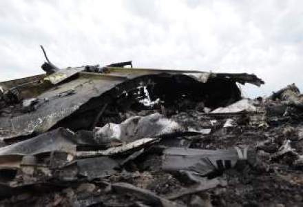 O cutie neagra a avionului prabusit in Ucraina a fost gasita de salvatori