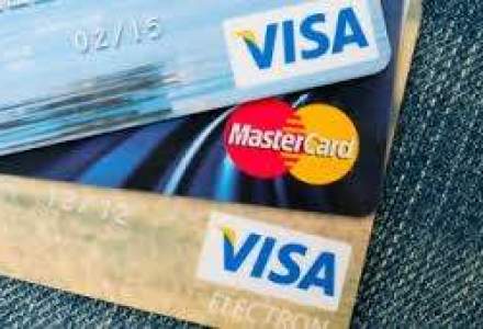 MasterCard, obligata sa elimine comisioanele interbancare la plata cu cardul in sase luni