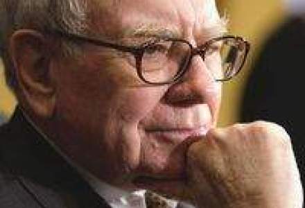 Warren Buffett cumpara o companie feroviara cu 44 mld. dolari