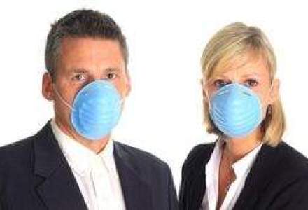 Gripa porcina a crescut de 20 de ori vanzarile de masti in farmaciile Help Net