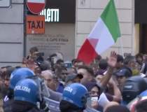 Proteste violente în Italia,...