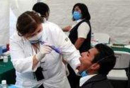 Romanii, in lupta contra gripei porcine: Peste 270.000 de persoane vaccinate