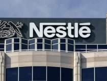 Nestlé vinde o parte din...