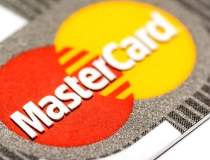 UE acuza MasterCard de...