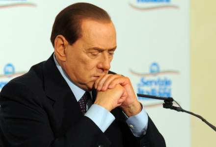 Comisia Europeană: Vodca dăruită de Putin lui Berlusconi încalcă sancţiunile impuse Rusiei