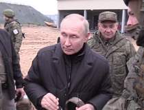 VIDEO - Putin, cu pușca pe...