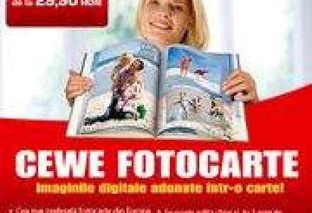 Real face concurenta Carrefour pe segmentul serviciilor foto