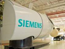 Profitul net al Siemens a...
