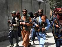 Cătușe pe presă: Talibanii...