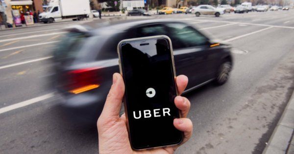 Schimbări pentru clienții Uber. Cât costă acum anularea unei curse în București