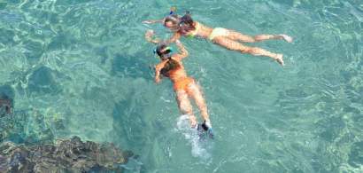 INEDIT: Snorkeling si scuba diving contra...unui sac de deseuri