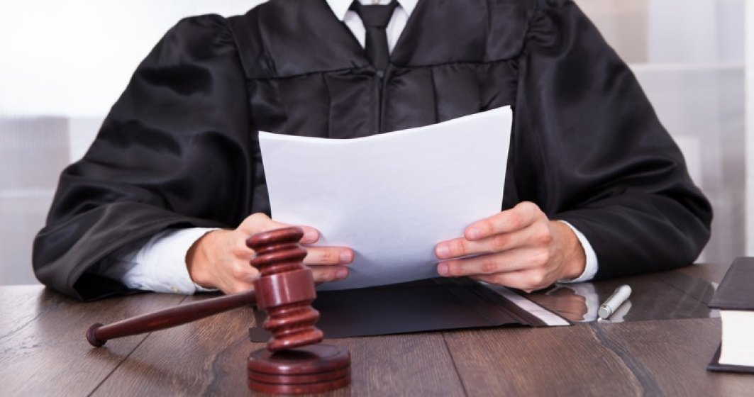 Curtea Constitutionala a admis unele sesizari privind Legea darii in plata