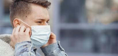 OMS: Carantina ar putea fi evitată dacă 95% din oameni ar purta masca, în...