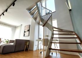 GALERIE FOTO | Cum arată un apartament duplex de 300.000 de euro din nordul...