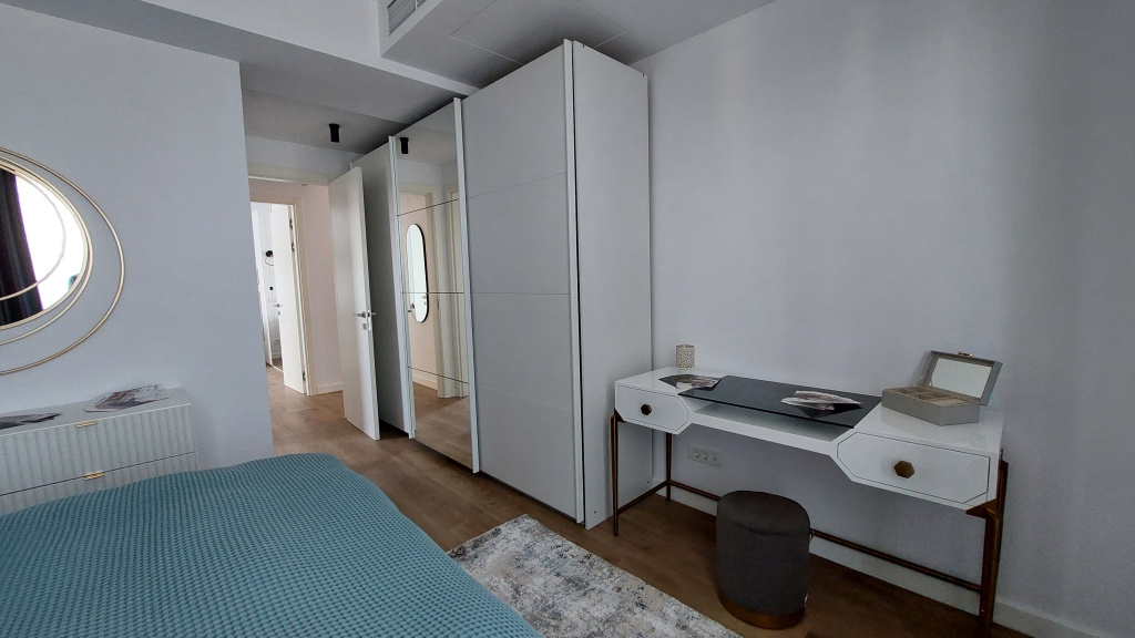 GALERIE FOTO: Cum arată un apartament de 200.000 de euro dintr-un complex scump din nordul Capitalei