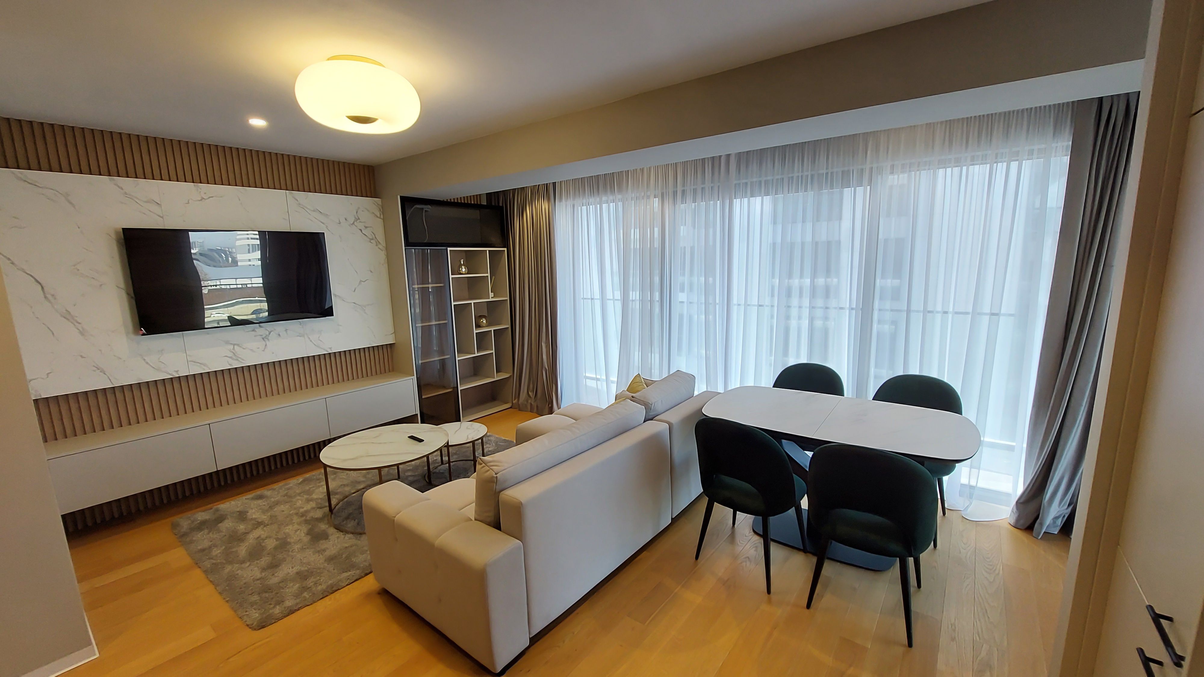 GALERIE FOTO | Ce găsești într-un apartament de circa 380.000 euro, de trei camere, dintr-un complex de lux din București - Poza 39