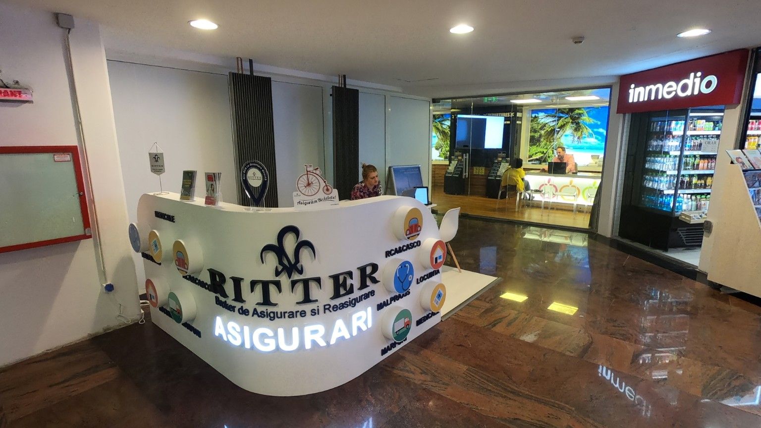 (P) Brokerul de asigurari RITTER deschide un nou concept de agentie in Baneasa Shopping City si ofera asigurari de calatorie gratuite