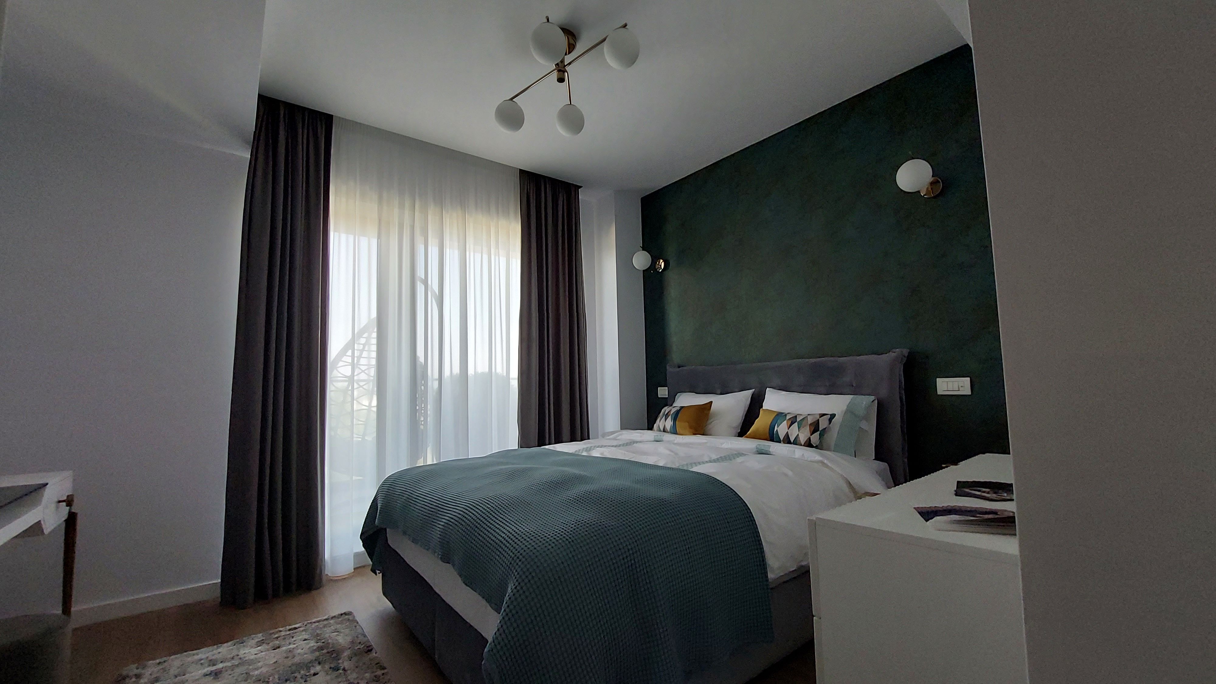 GALERIE FOTO: Cum arată un apartament de 200.000 de euro dintr-un complex scump din nordul Capitalei