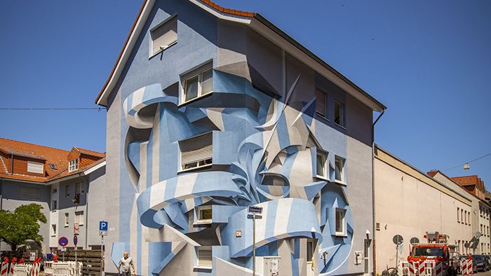 Artistul care deseneaza forme 3D pe cladiri [GALERIE FOTO]