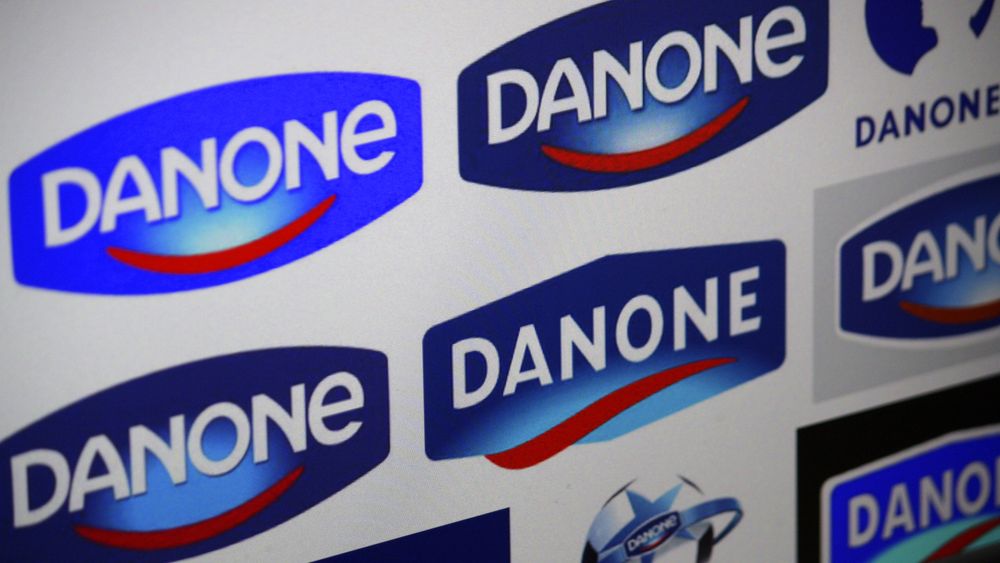 Putin a naționalizat fabricile Danone și Carlsberg. Francezii îi cer ajutorul lui Macron