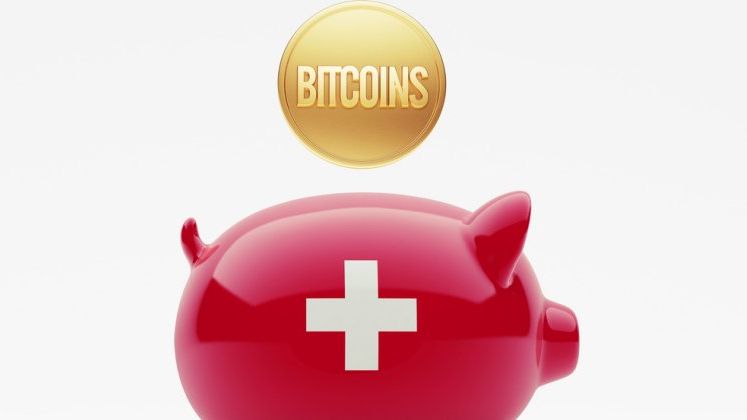 In timp ce chinezii pun bete in roate monedei Bitcoin, elvetienii se pregatesc sa isi plateasca taxele cu ea