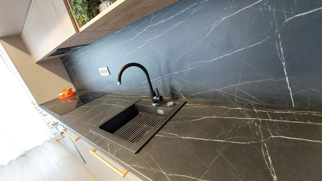 Ce găsești într-un apartament de 3 camere, de circa 190.000 euro, din nordul Capitalei - Imagine 3